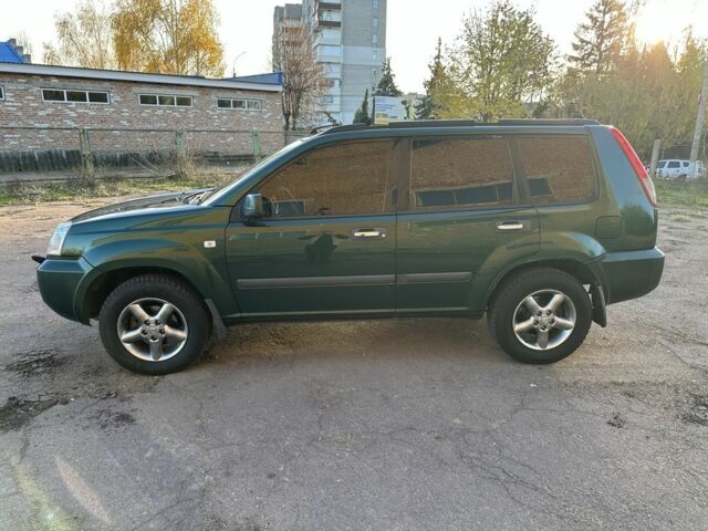 Зеленый Ниссан ИксТрейл, объемом двигателя 2.2 л и пробегом 394 тыс. км за 4700 $, фото 3 на Automoto.ua