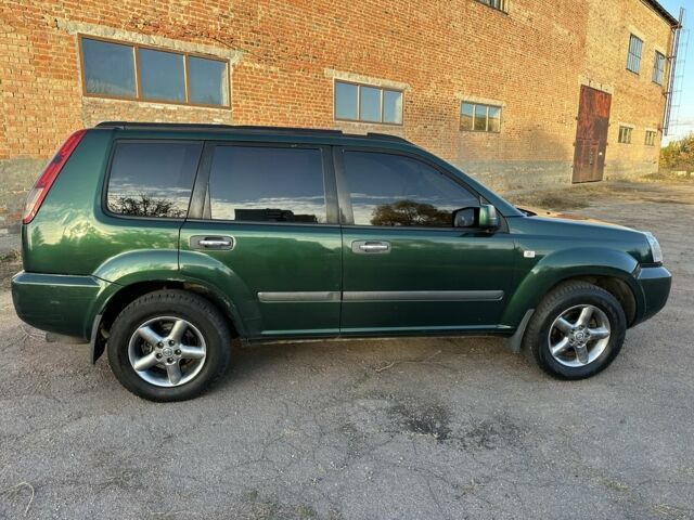 Зеленый Ниссан ИксТрейл, объемом двигателя 2.2 л и пробегом 394 тыс. км за 4700 $, фото 7 на Automoto.ua