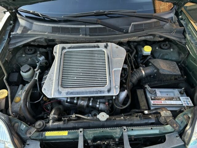 Зеленый Ниссан ИксТрейл, объемом двигателя 2.2 л и пробегом 394 тыс. км за 4700 $, фото 20 на Automoto.ua