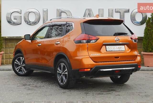 Оранжевый Ниссан ИксТрейл, объемом двигателя 2 л и пробегом 70 тыс. км за 19900 $, фото 7 на Automoto.ua