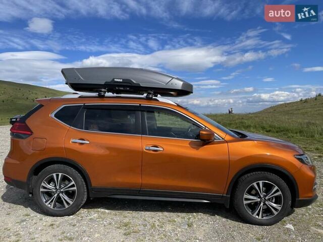 Оранжевый Ниссан ИксТрейл, объемом двигателя 2 л и пробегом 73 тыс. км за 20000 $, фото 12 на Automoto.ua