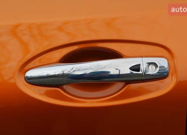 Оранжевый Ниссан ИксТрейл, объемом двигателя 2 л и пробегом 70 тыс. км за 19900 $, фото 13 на Automoto.ua