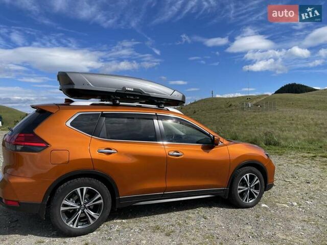 Оранжевый Ниссан ИксТрейл, объемом двигателя 2 л и пробегом 73 тыс. км за 20000 $, фото 7 на Automoto.ua