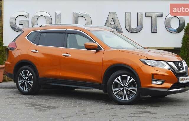 Оранжевый Ниссан ИксТрейл, объемом двигателя 2 л и пробегом 70 тыс. км за 19900 $, фото 1 на Automoto.ua