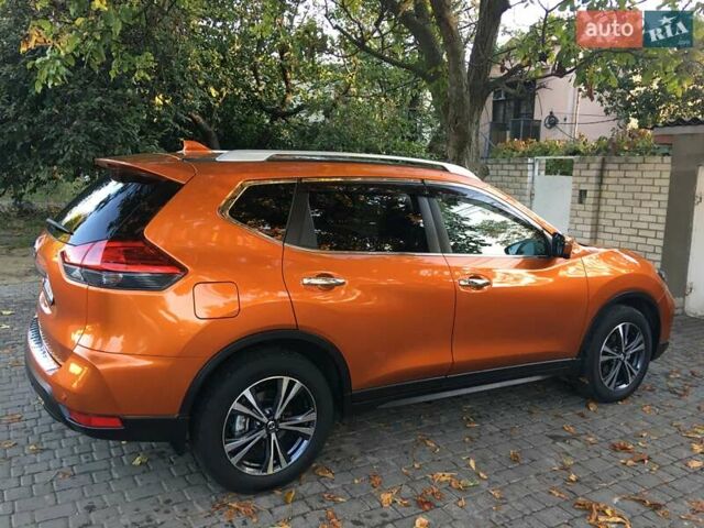 Оранжевый Ниссан ИксТрейл, объемом двигателя 2 л и пробегом 73 тыс. км за 20000 $, фото 2 на Automoto.ua