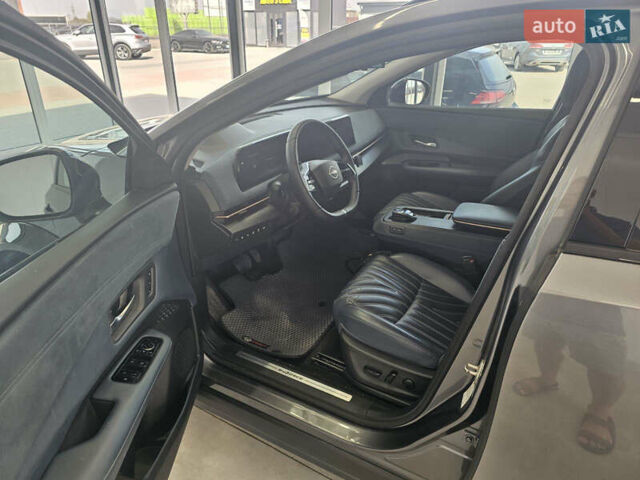 Серый Ниссан Ariya, объемом двигателя 0 л и пробегом 19 тыс. км за 30000 $, фото 4 на Automoto.ua