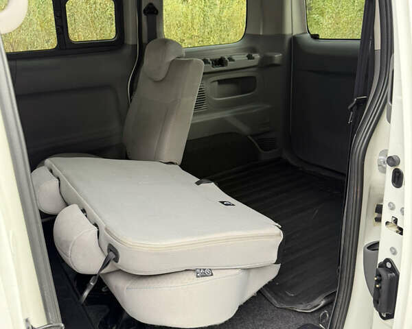 Белый Ниссан e-NV200, объемом двигателя 0 л и пробегом 124 тыс. км за 9950 $, фото 26 на Automoto.ua