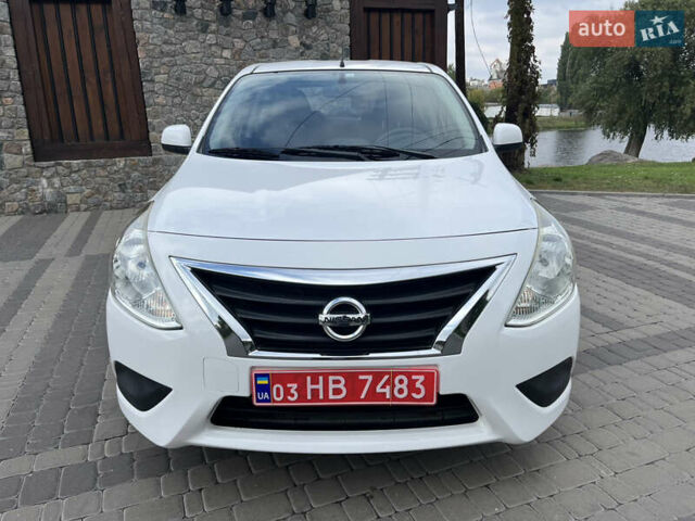 Белый Ниссан Latio, объемом двигателя 1.2 л и пробегом 68 тыс. км за 7500 $, фото 2 на Automoto.ua