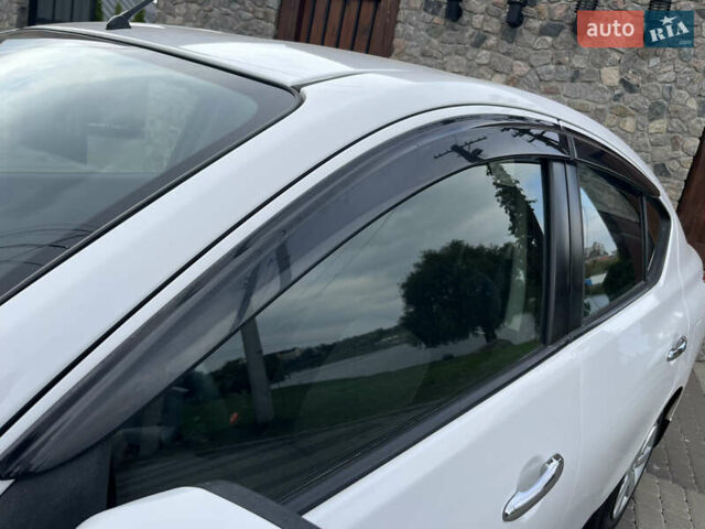 Белый Ниссан Latio, объемом двигателя 1.2 л и пробегом 68 тыс. км за 7500 $, фото 63 на Automoto.ua