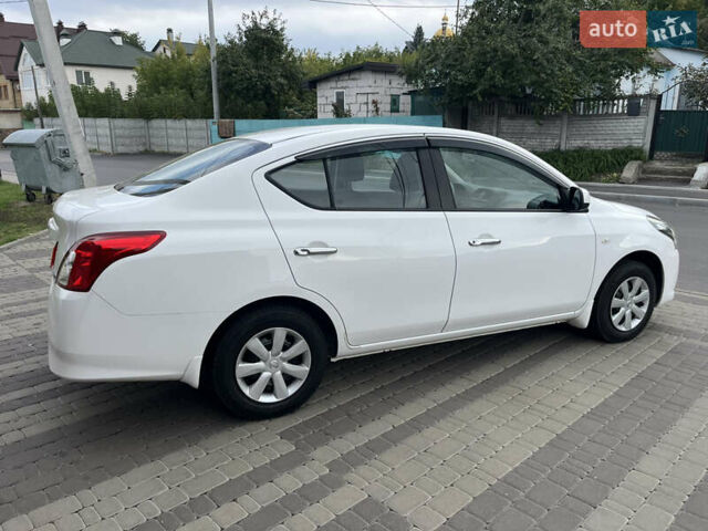 Белый Ниссан Latio, объемом двигателя 1.2 л и пробегом 68 тыс. км за 7500 $, фото 46 на Automoto.ua