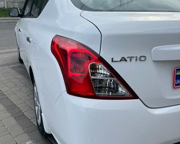 Белый Ниссан Latio, объемом двигателя 1.2 л и пробегом 68 тыс. км за 7500 $, фото 27 на Automoto.ua