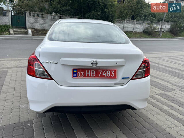 Белый Ниссан Latio, объемом двигателя 1.2 л и пробегом 68 тыс. км за 7500 $, фото 32 на Automoto.ua