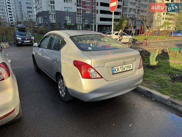 Серый Ниссан Latio, объемом двигателя 0 л и пробегом 95 тыс. км за 5900 $, фото 3 на Automoto.ua