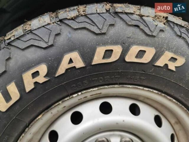 Белый Ниссан NV1500, объемом двигателя 4 л и пробегом 128 тыс. км за 27000 $, фото 2 на Automoto.ua