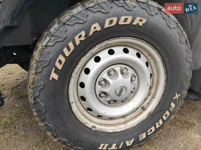 Белый Ниссан NV1500, объемом двигателя 4 л и пробегом 128 тыс. км за 27000 $, фото 3 на Automoto.ua