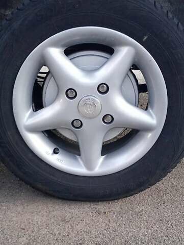 Білий Ніссан NV200, об'ємом двигуна 1.5 л та пробігом 324 тис. км за 8300 $, фото 4 на Automoto.ua