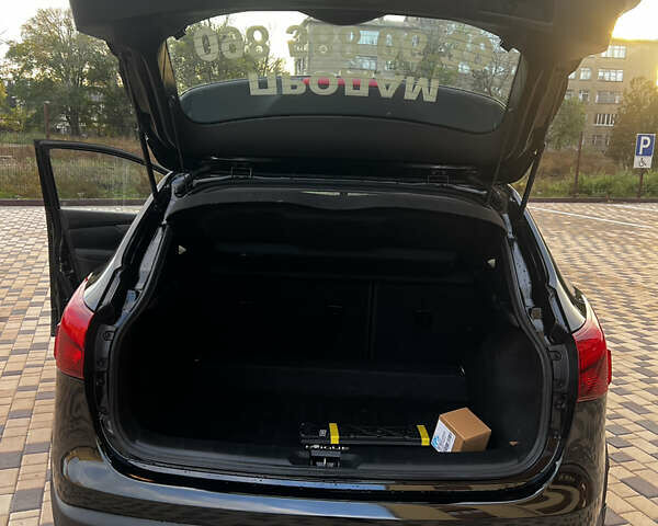 Черный Ниссан Rogue Sport, объемом двигателя 2 л и пробегом 213 тыс. км за 12800 $, фото 6 на Automoto.ua