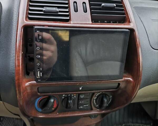 Красный Ниссан Terrano II, объемом двигателя 3 л и пробегом 274 тыс. км за 4300 $, фото 2 на Automoto.ua