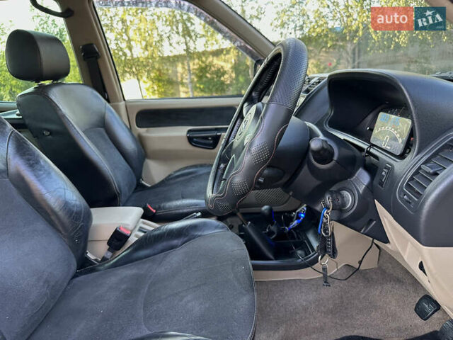 Синий Ниссан Terrano II, объемом двигателя 3 л и пробегом 168 тыс. км за 5500 $, фото 18 на Automoto.ua