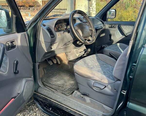 Зеленый Ниссан Terrano II, объемом двигателя 2.39 л и пробегом 275 тыс. км за 4800 $, фото 4 на Automoto.ua