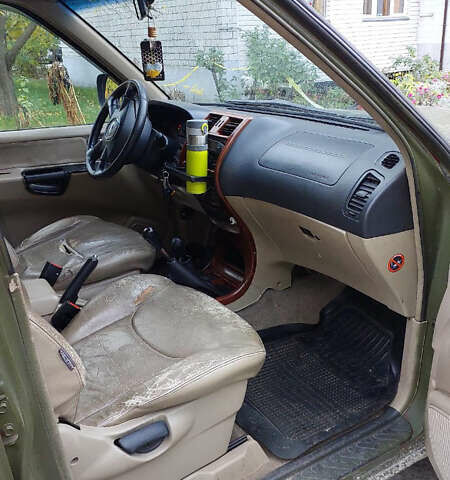 Зелений Ніссан Terrano II, об'ємом двигуна 3 л та пробігом 269 тис. км за 3195 $, фото 8 на Automoto.ua