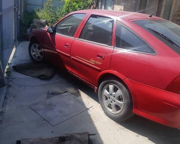 Красный Опель 1.8 Liter, объемом двигателя 1.8 л и пробегом 300 тыс. км за 2400 $, фото 8 на Automoto.ua