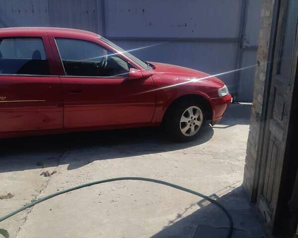 Красный Опель 1.8 Liter, объемом двигателя 1.8 л и пробегом 300 тыс. км за 2400 $, фото 9 на Automoto.ua