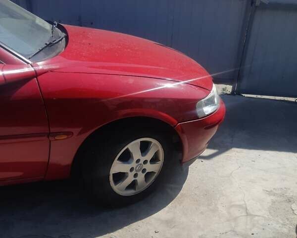 Красный Опель 1.8 Liter, объемом двигателя 1.8 л и пробегом 300 тыс. км за 2400 $, фото 3 на Automoto.ua