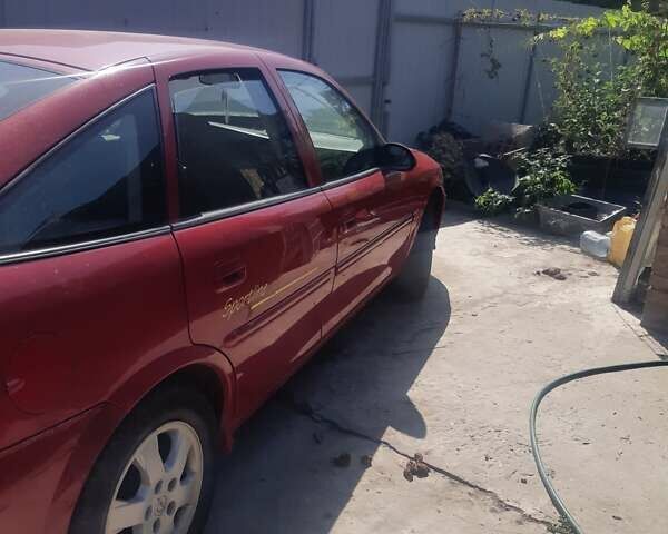 Красный Опель 1.8 Liter, объемом двигателя 1.8 л и пробегом 300 тыс. км за 2400 $, фото 11 на Automoto.ua