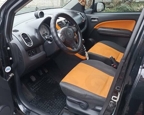 Черный Опель Агила, объемом двигателя 1.2 л и пробегом 195 тыс. км за 4650 $, фото 11 на Automoto.ua