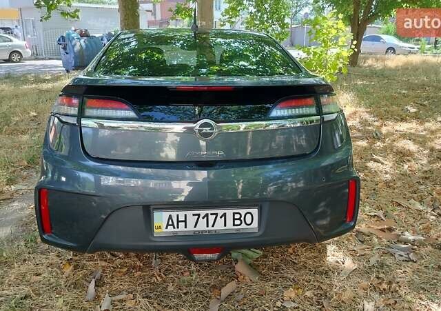Черный Опель Ампера, объемом двигателя 1.4 л и пробегом 160 тыс. км за 9000 $, фото 2 на Automoto.ua