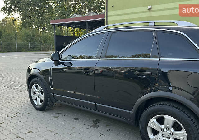 Черный Опель Антара, объемом двигателя 1.99 л и пробегом 232 тыс. км за 6500 $, фото 12 на Automoto.ua
