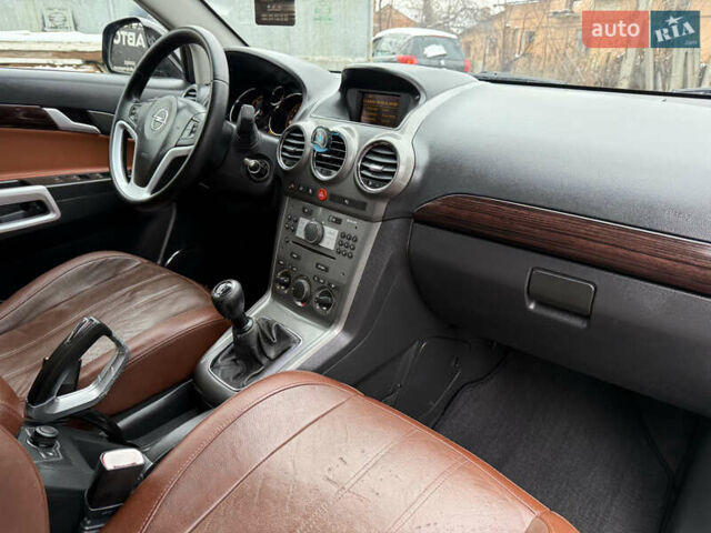 Чорний Опель Антара, об'ємом двигуна 2 л та пробігом 250 тис. км за 8950 $, фото 60 на Automoto.ua