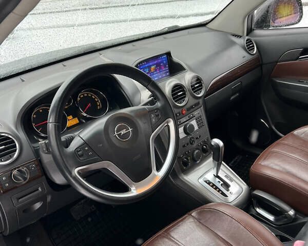 Черный Опель Антара, объемом двигателя 2 л и пробегом 225 тыс. км за 8400 $, фото 8 на Automoto.ua