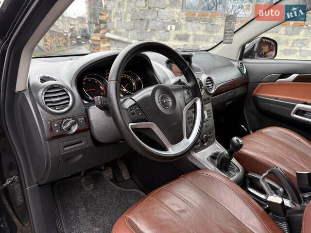 Чорний Опель Антара, об'ємом двигуна 2 л та пробігом 250 тис. км за 8950 $, фото 28 на Automoto.ua