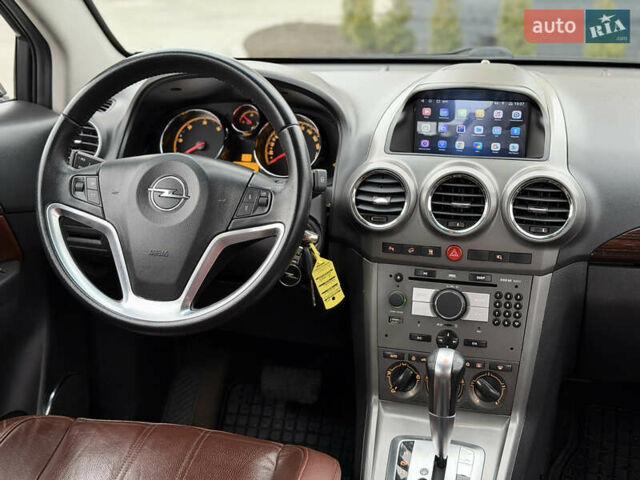 Черный Опель Антара, объемом двигателя 1.99 л и пробегом 226 тыс. км за 8500 $, фото 48 на Automoto.ua