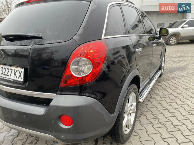 Черный Опель Антара, объемом двигателя 1.99 л и пробегом 235 тыс. км за 7500 $, фото 7 на Automoto.ua