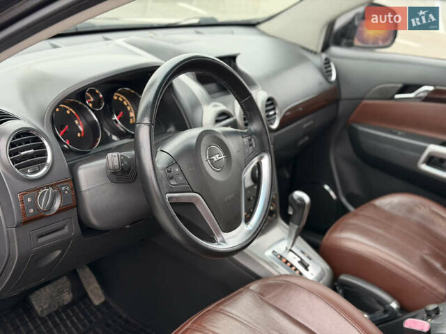 Черный Опель Антара, объемом двигателя 1.99 л и пробегом 226 тыс. км за 8500 $, фото 29 на Automoto.ua