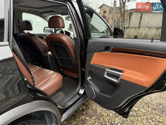 Чорний Опель Антара, об'ємом двигуна 2 л та пробігом 250 тис. км за 8950 $, фото 53 на Automoto.ua