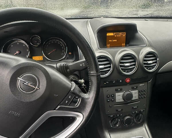Чорний Опель Антара, об'ємом двигуна 1.99 л та пробігом 250 тис. км за 8200 $, фото 18 на Automoto.ua