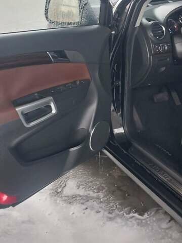 Черный Опель Антара, объемом двигателя 2 л и пробегом 270 тыс. км за 8650 $, фото 4 на Automoto.ua