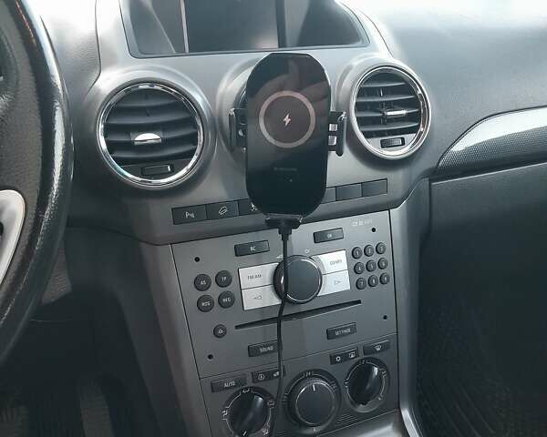 Черный Опель Антара, объемом двигателя 2 л и пробегом 217 тыс. км за 7500 $, фото 13 на Automoto.ua