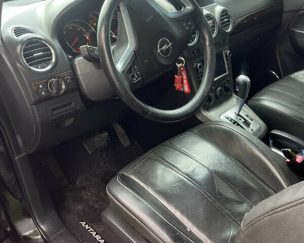 Черный Опель Антара, объемом двигателя 2 л и пробегом 315 тыс. км за 8700 $, фото 11 на Automoto.ua