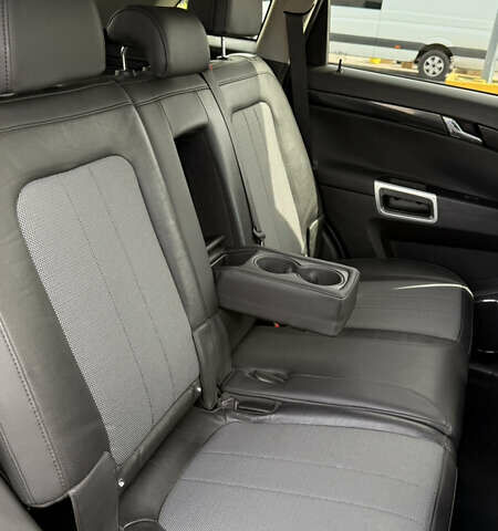 Черный Опель Антара, объемом двигателя 2.23 л и пробегом 178 тыс. км за 11200 $, фото 5 на Automoto.ua