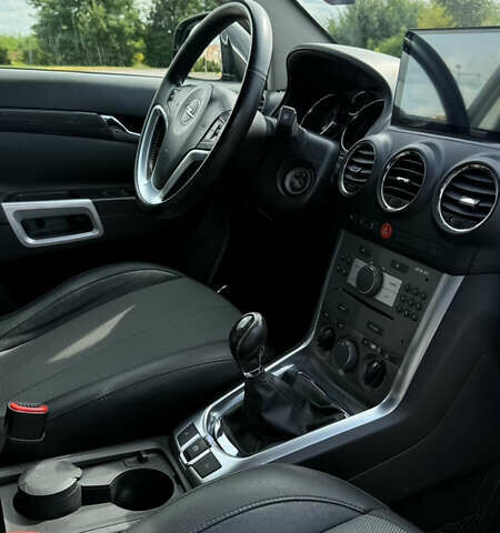 Черный Опель Антара, объемом двигателя 2.23 л и пробегом 178 тыс. км за 11200 $, фото 3 на Automoto.ua