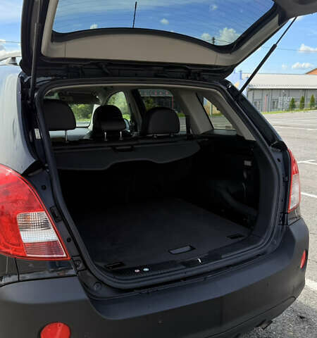 Черный Опель Антара, объемом двигателя 2.23 л и пробегом 178 тыс. км за 11200 $, фото 4 на Automoto.ua