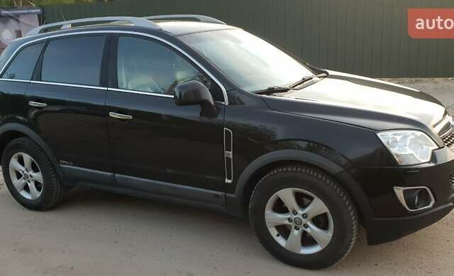 Черный Опель Антара, объемом двигателя 2.23 л и пробегом 229 тыс. км за 10322 $, фото 3 на Automoto.ua