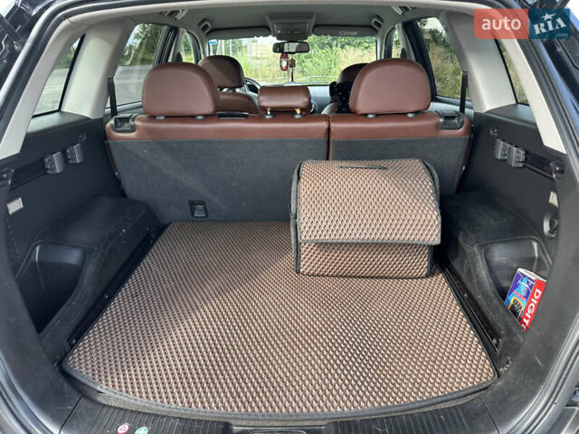 Черный Опель Антара, объемом двигателя 2.2 л и пробегом 222 тыс. км за 10200 $, фото 24 на Automoto.ua