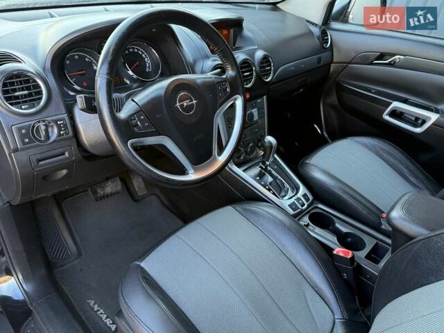 Черный Опель Антара, объемом двигателя 2.2 л и пробегом 225 тыс. км за 9700 $, фото 38 на Automoto.ua