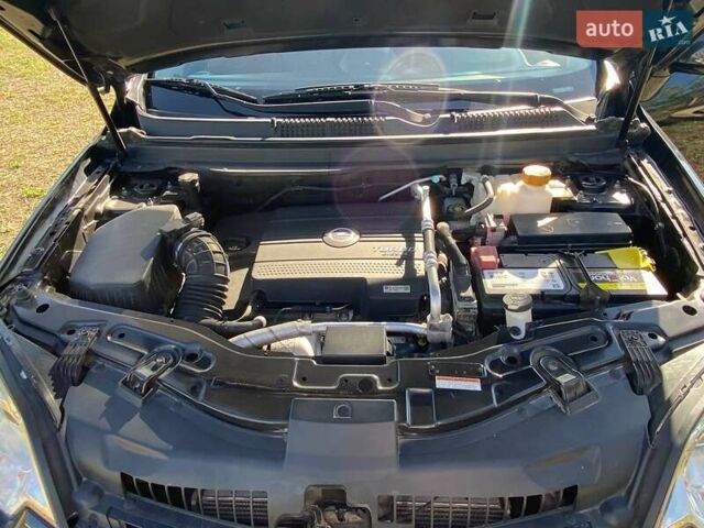 Чорний Опель Антара, об'ємом двигуна 2.2 л та пробігом 159 тис. км за 10000 $, фото 7 на Automoto.ua